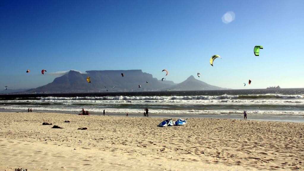 Kitesurfing on Blouberg beach in Cape Town, South Africa.
