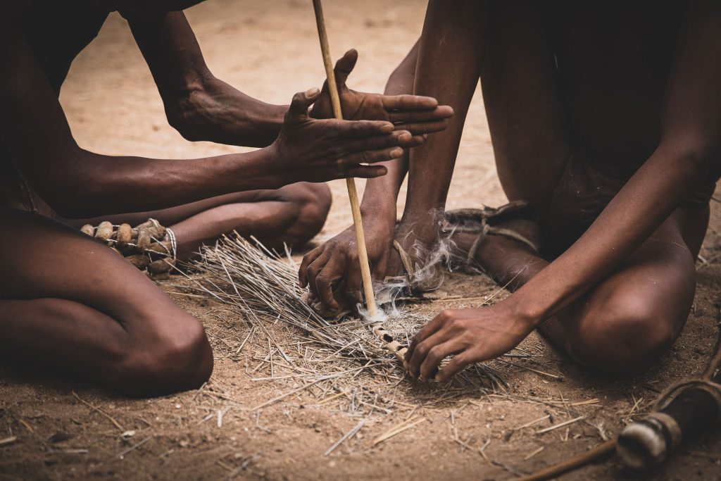 San tribe making fire in Namibia | Photo credits: Moving Lens