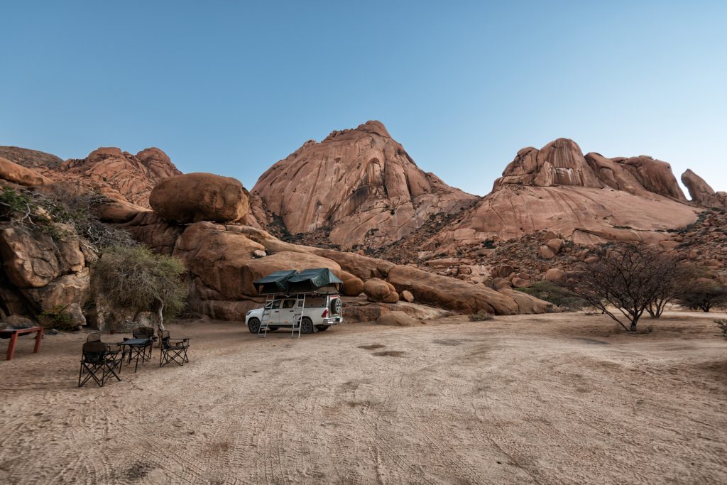 Camping equipped 4x4 rental vehicle at Spitzokppe, Namibia.