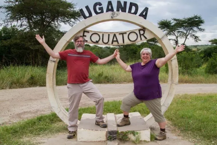 Corinne and Jim Vail at the Uganda equator marker | Photo credits: Reflections Enroute