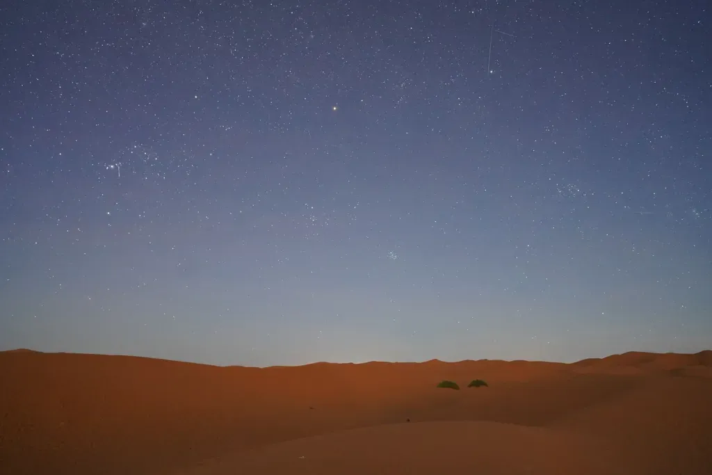 Stars above the Sahara desert, Morocco | Photo credits: The Daily Packers