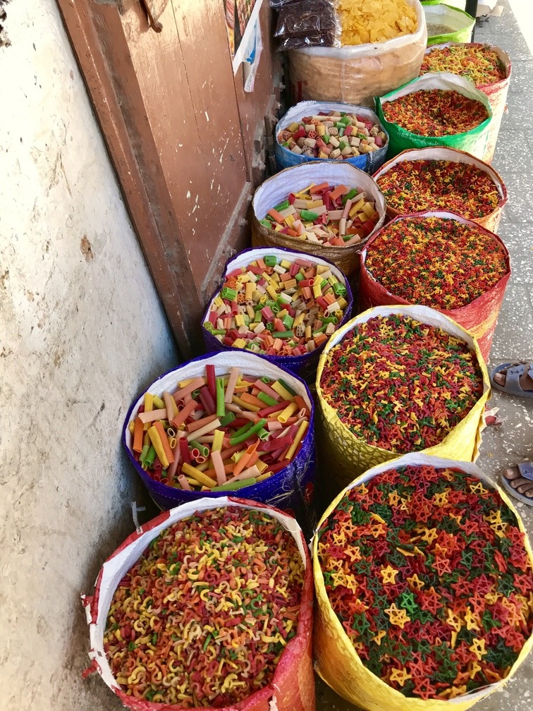 Colourful goods sold in Stone Town, Zanzibar | Photo credits: The Magic of Traveling