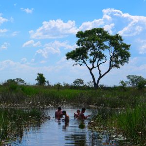 Swimming in the Okavango Delta, Botswana | Photo credit: Ella