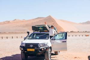 A happy customer in a Toyota Hilux.