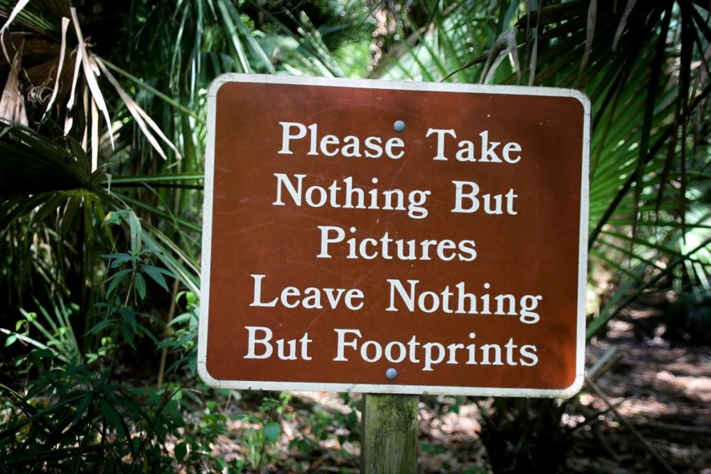 A sign instructing campers to leave nothing but footprints.
