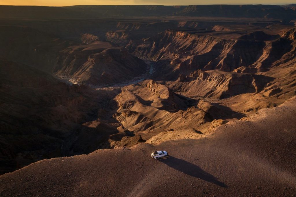A vehicle alongside the Fish River Canyon in Namibia.