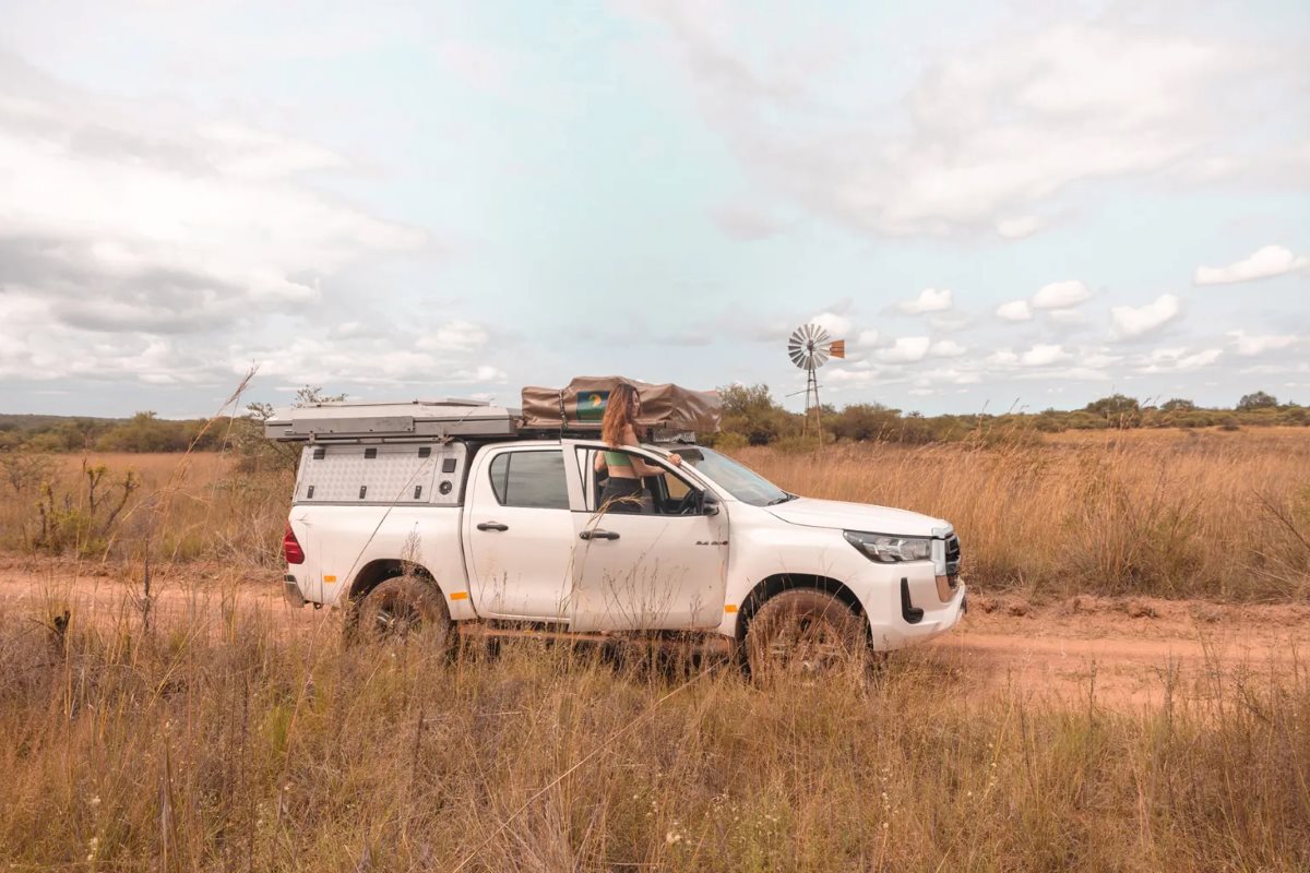 Chanel with the Avis Safari Toyota Hilux 4x4 camper.