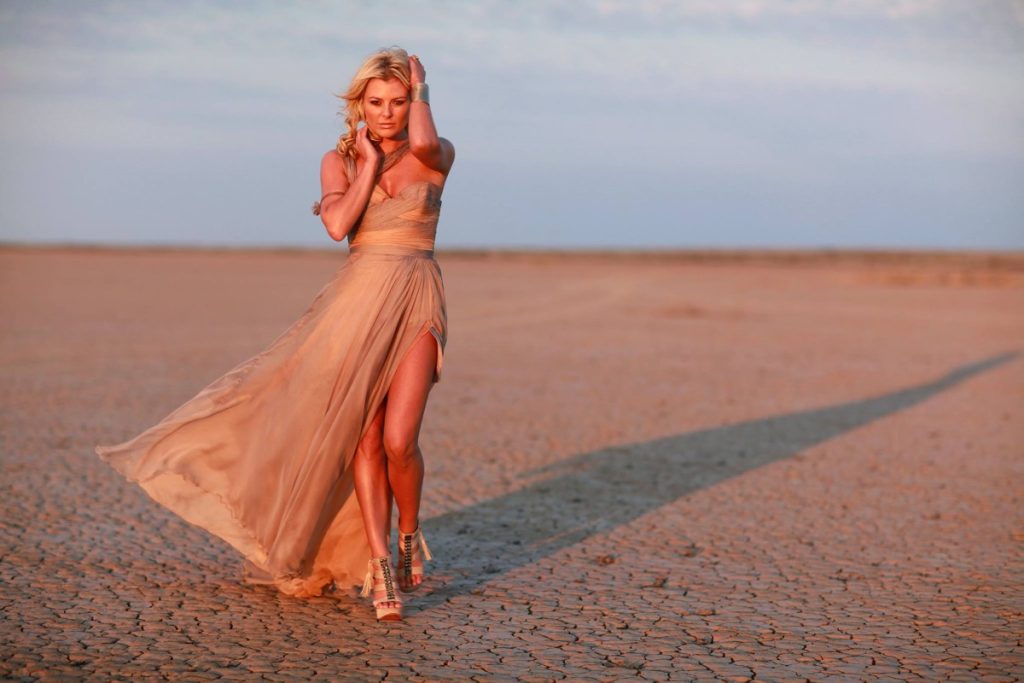 Karlien van Jaarsveld in a desert.