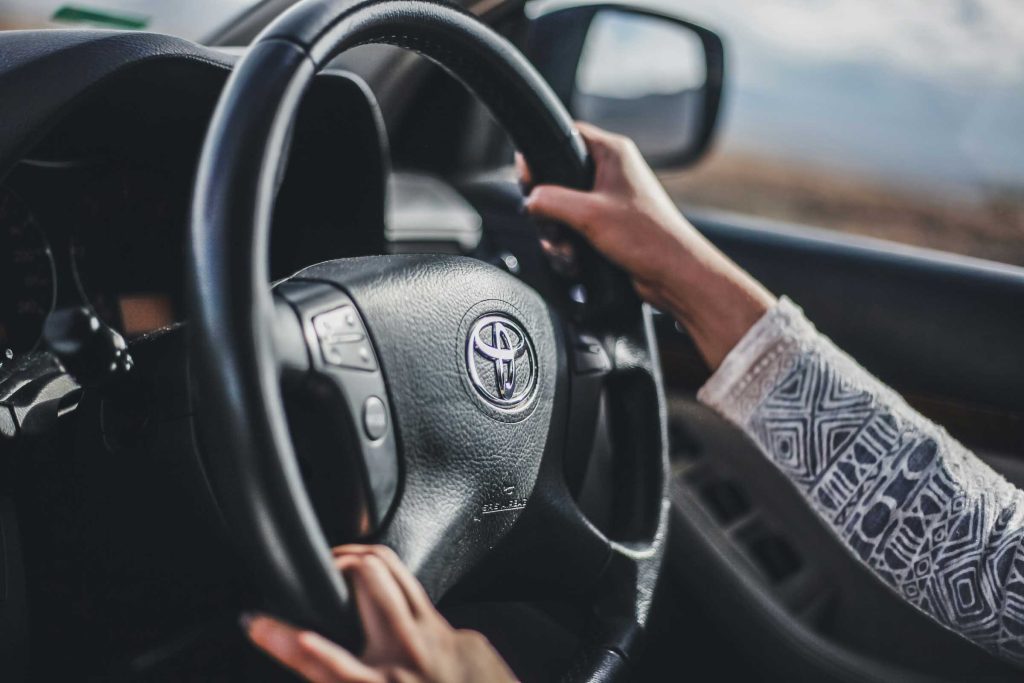 A woman driving alone in South Africa.