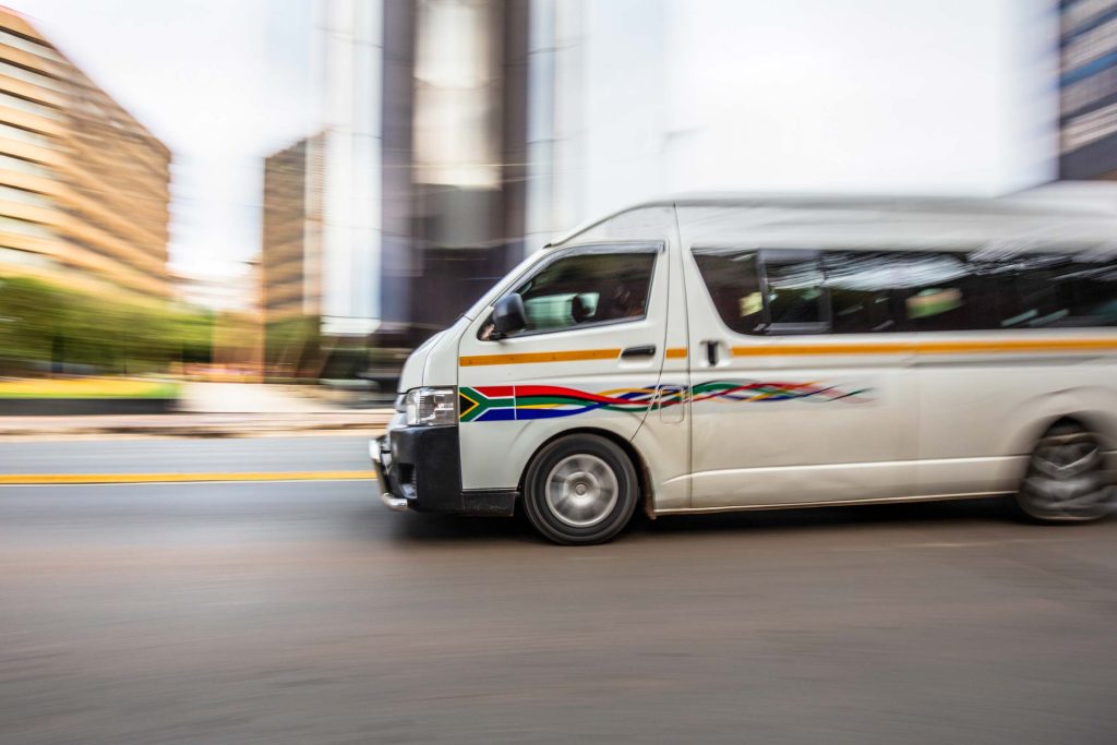 Taxi bus travelling in Johannesburg city.