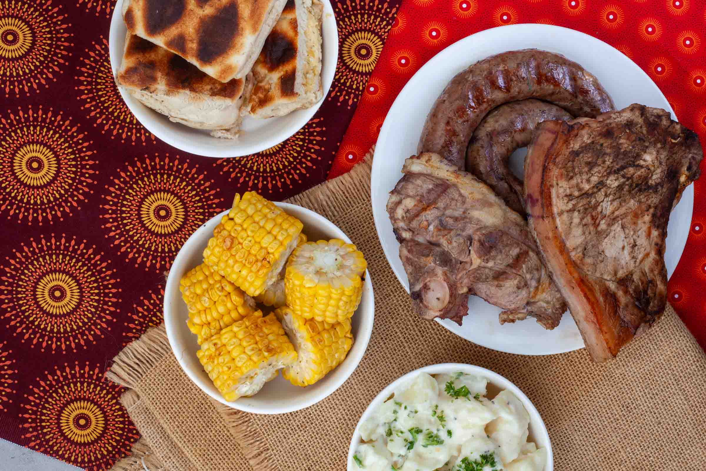 Various braai dishes on a table.