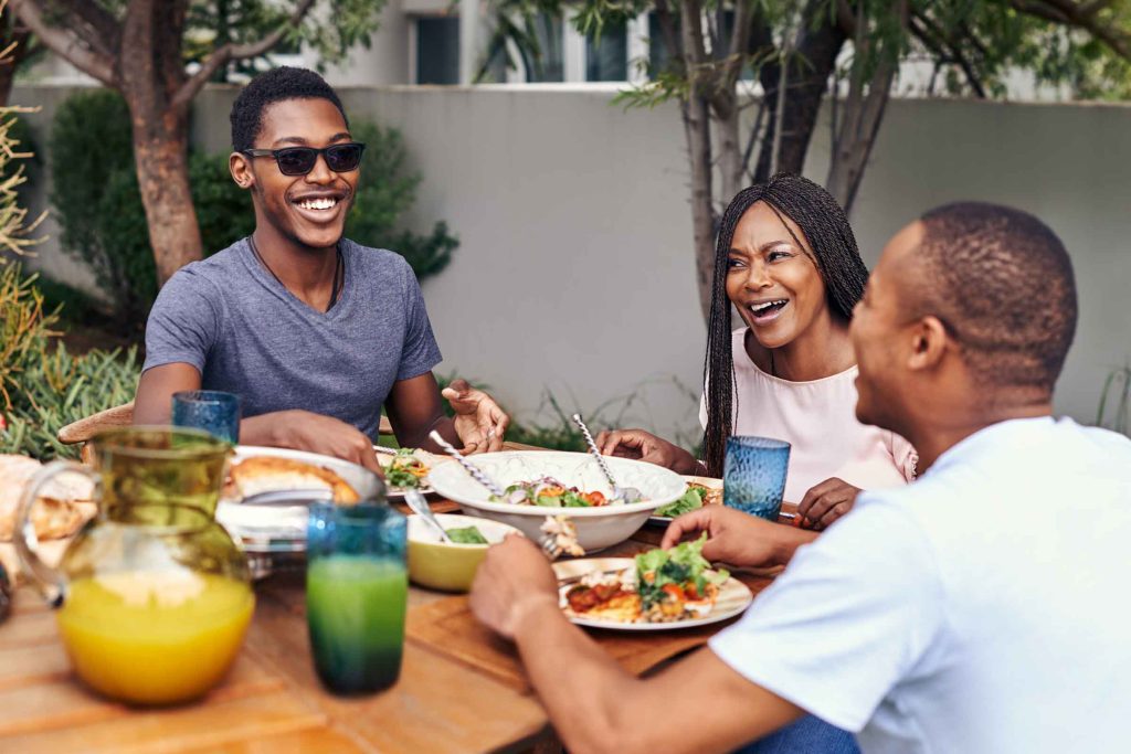 Friends enjoying a braai.