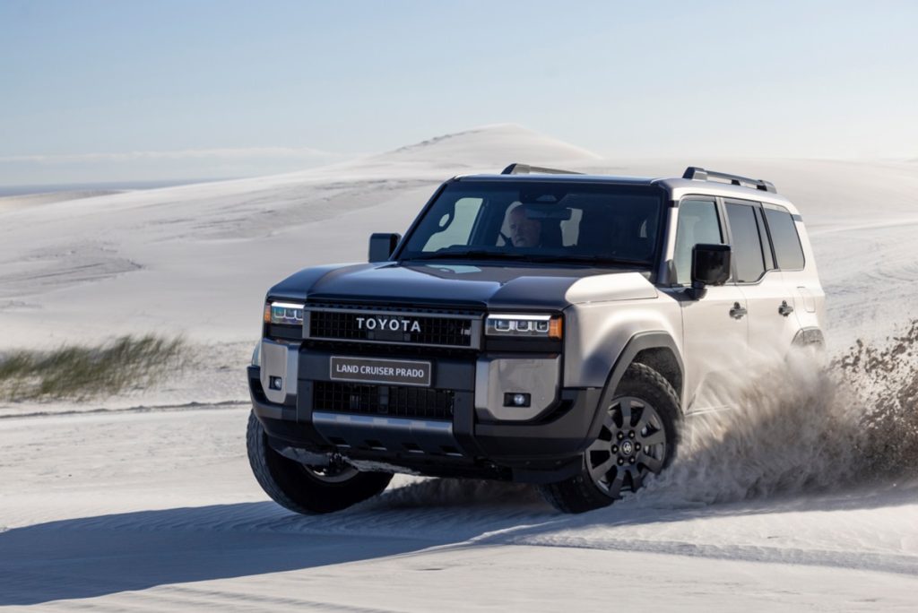 The new Toyota Land Cruiser Prado on sand dunes.