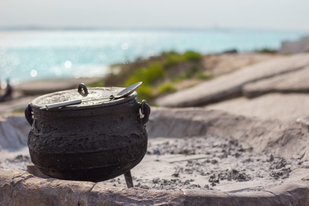 A potjie on a beach in South Africa.