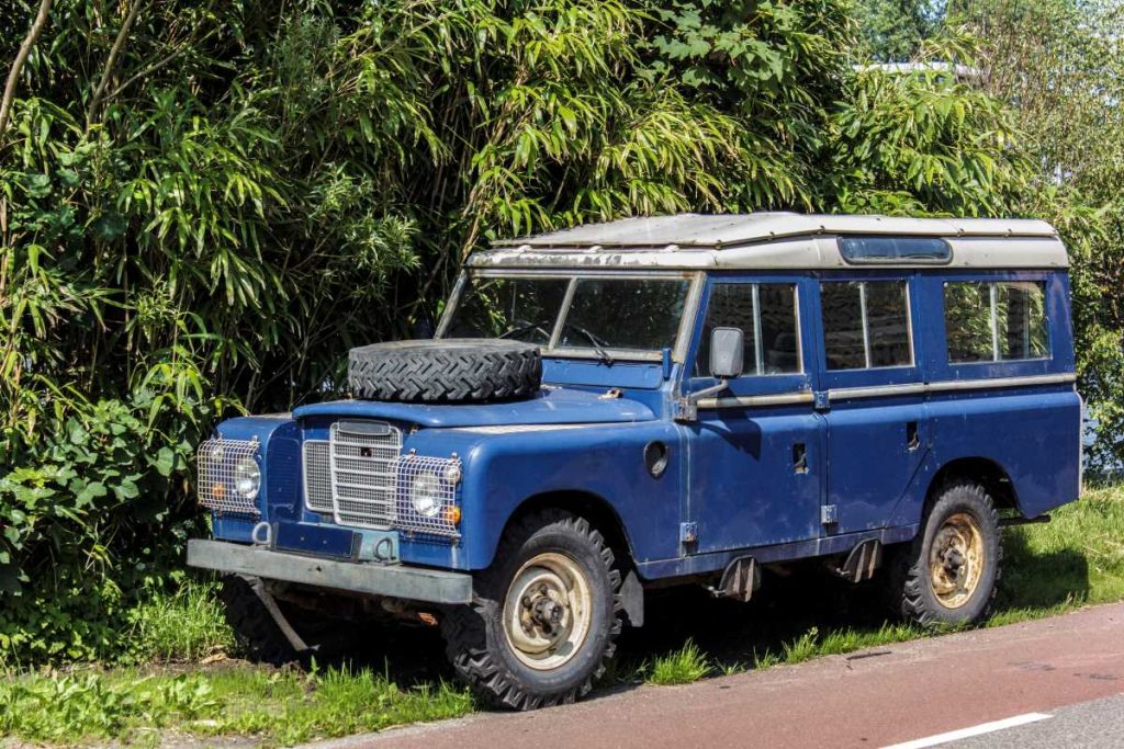 An old blue Land Rover.