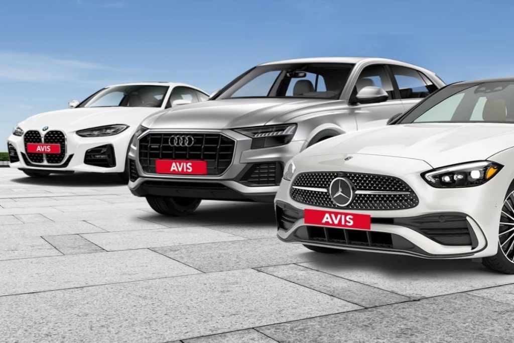 Avis luxury vehicles lined up.