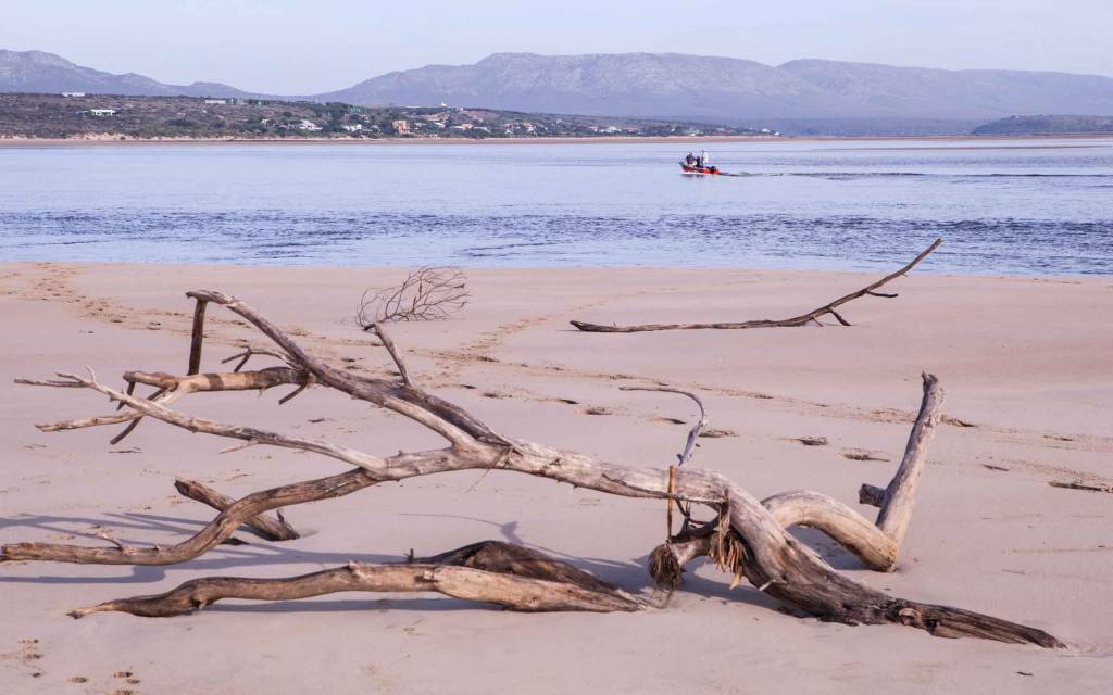 A boat on the mouth of the Breede River near Witsand, South Africa.