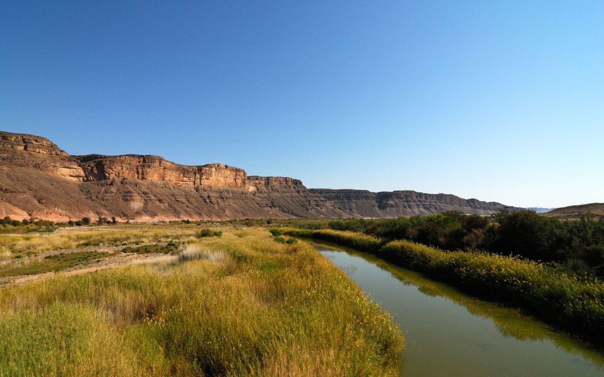 De Oranjerivier, Panorama, Zuid-Afrika | Foto: aghezzi via Getty