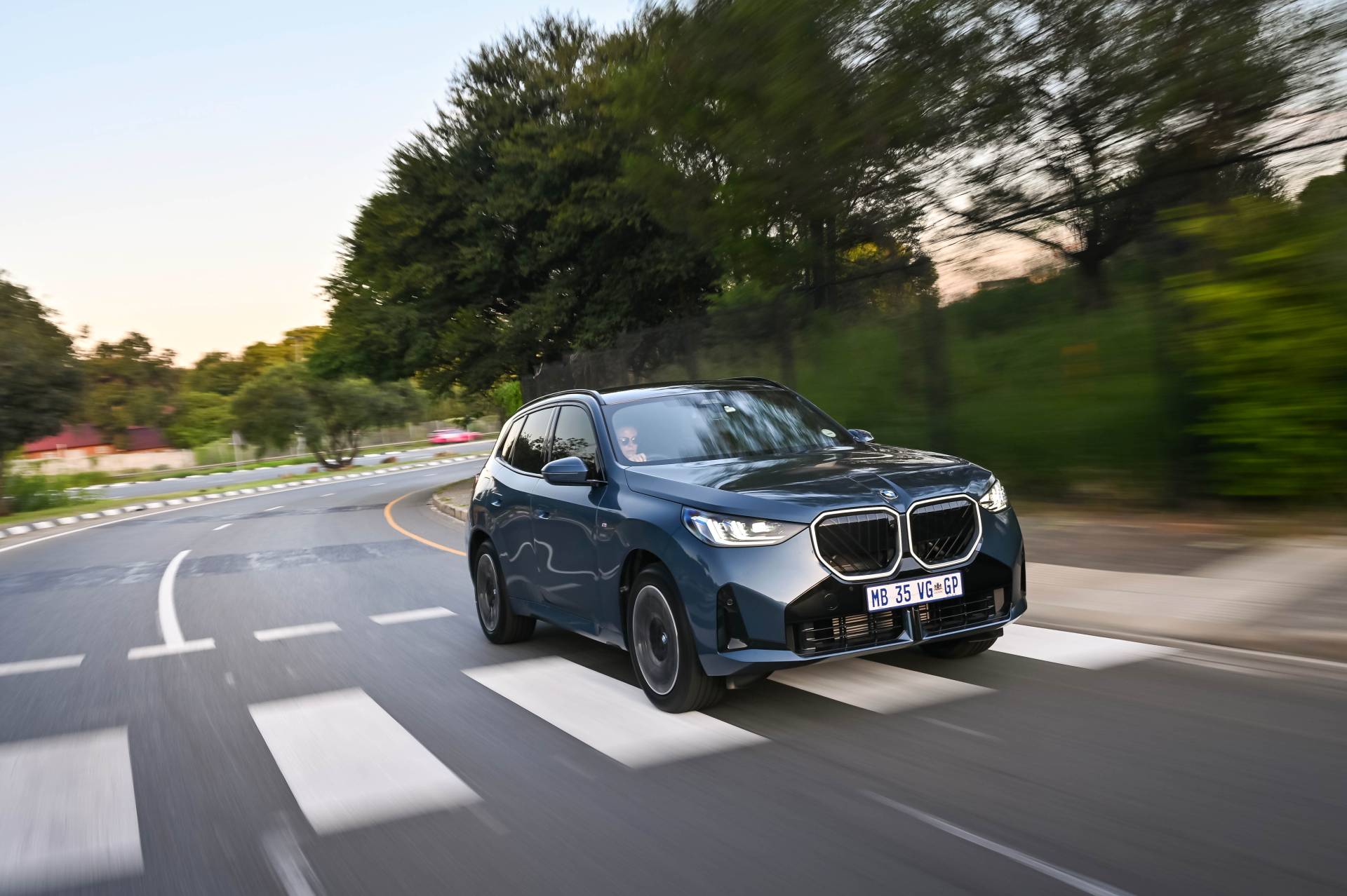 BMW speeding over a crosswalk