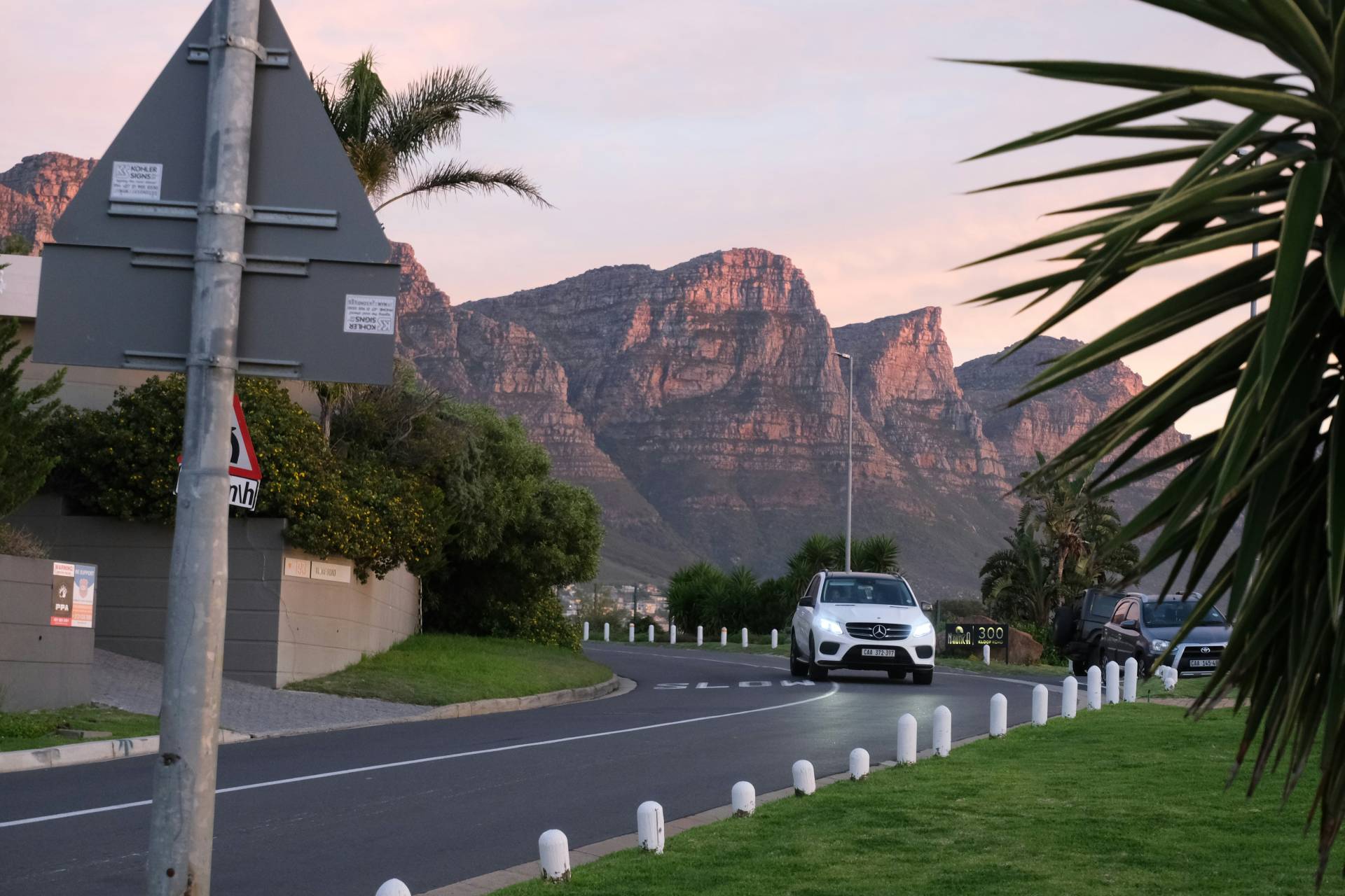Car driving in Cape Town at sunset