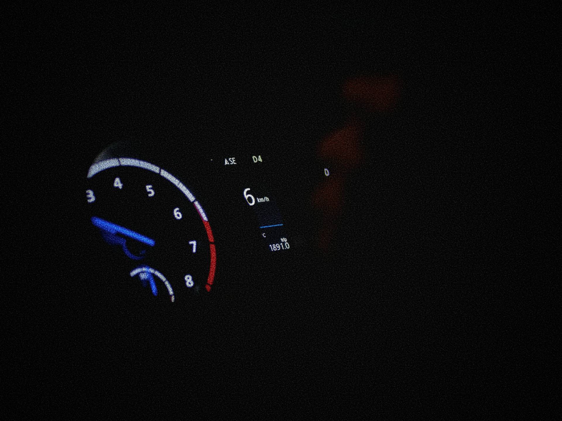 Fuel Gauge of a car at night