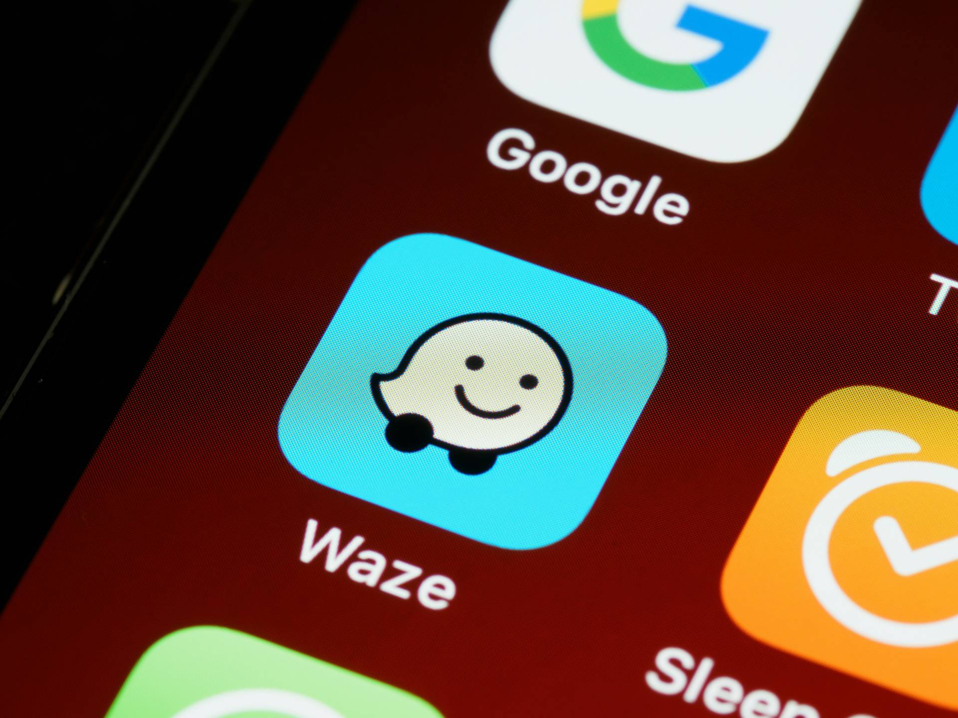Waze app icon on smartphone
