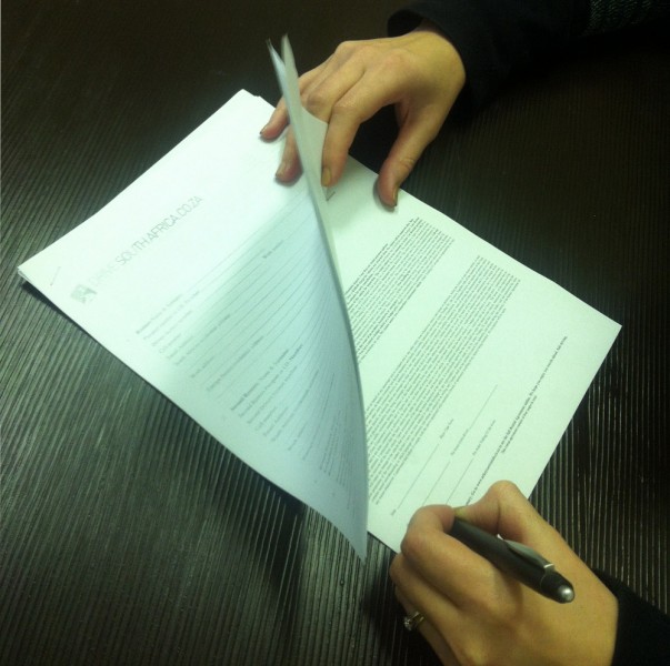 Signing the car hire excess agreement